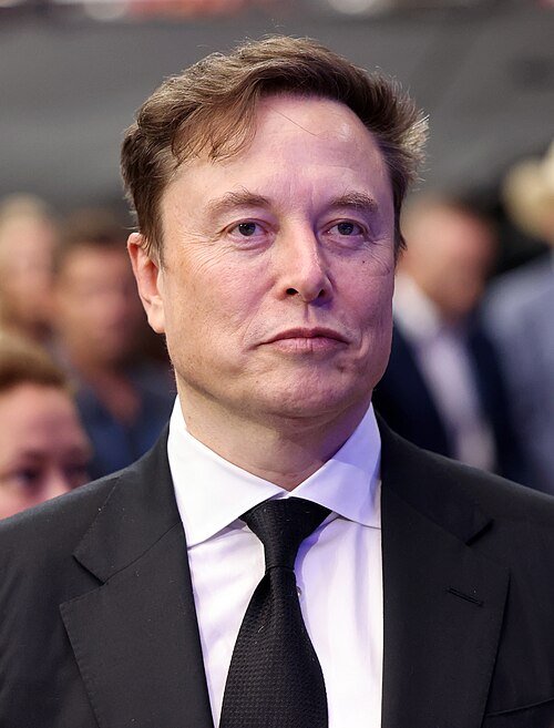 Elon Musk in a formal portrait